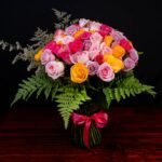 100 Rosas multicolor en jarrón